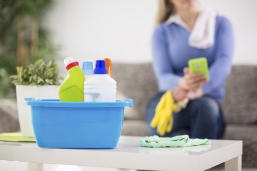 Cleaner reviewing service details and cancellation terms at a property