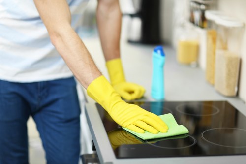 Local carpet cleaner treating stains in a Hackney apartment