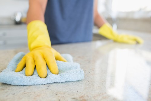 Worker checking hazards before starting carpet cleaning