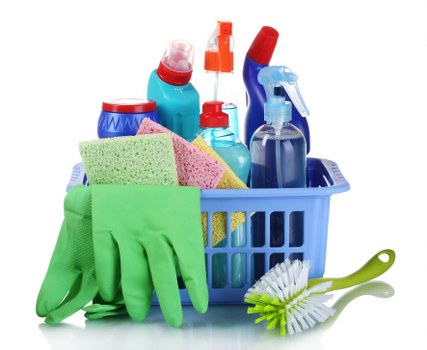 Professional cleaner servicing a workspace in E8 after hours