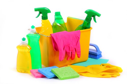 Clearance service sorting items inside a Hackney flat in E8